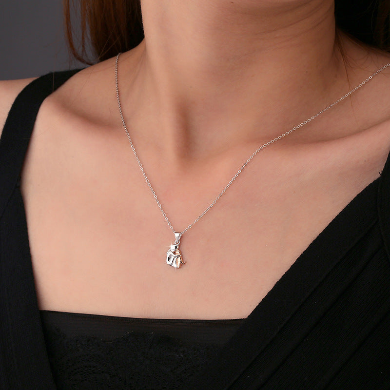 S925 sterling silver little girl and dog embrace necklace for women fashionable and simple contrasting color collarbone chain