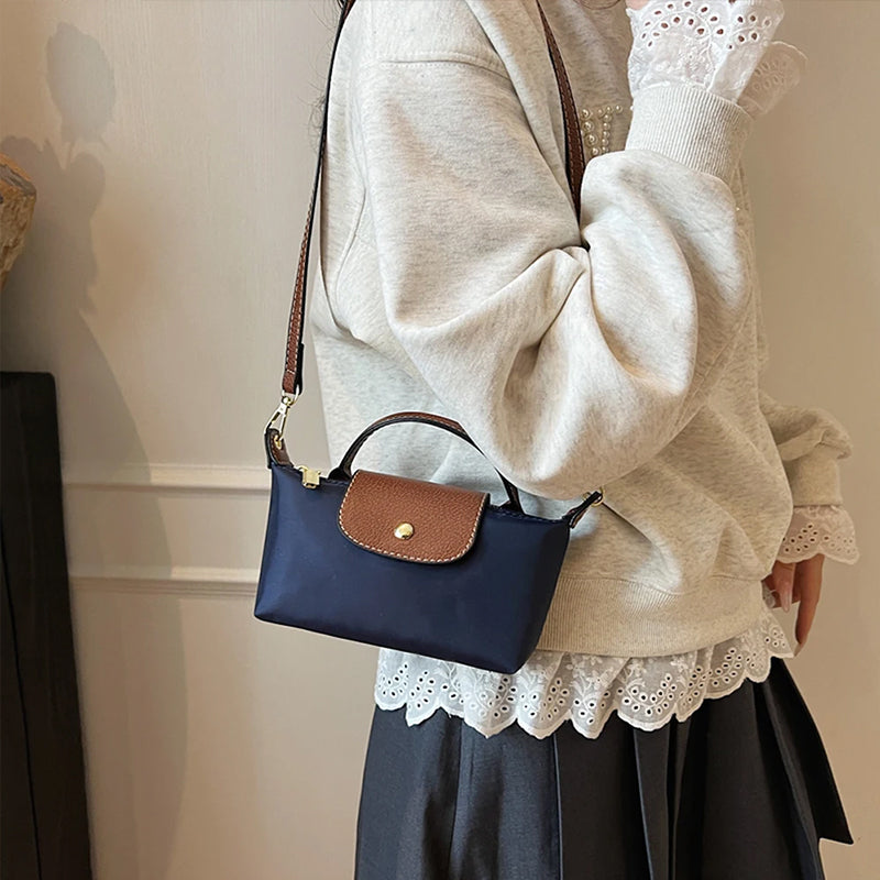 2025 Women's Mini Dumpling Handbag. Made of high - end nylon. Stylish shoulder/crossbody phone bag.